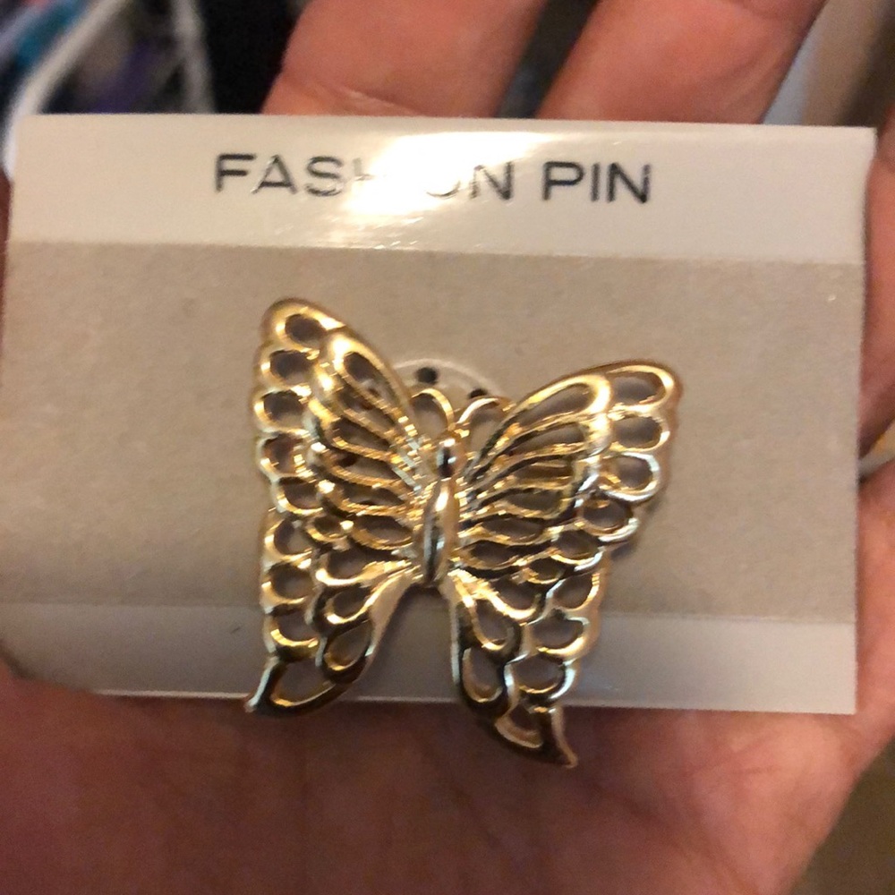 Gold butterfly brooch